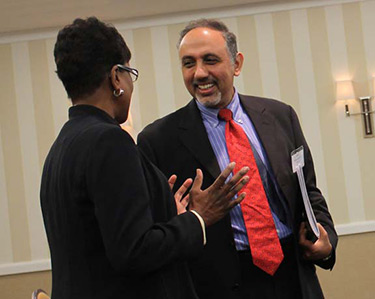 two business people interacting at a networking conference