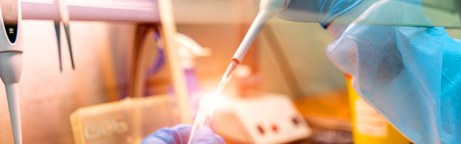 person working under a ventilation hood